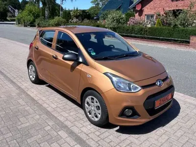 Gebraucht Hyundai i10 87 PS (63 kW) 2015 Orange Kleinwagen
