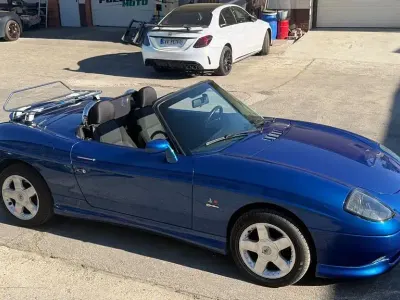 Gebraucht Fiat Barchetta 131 PS (96 kW) 1995 Blau Cabrio