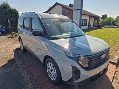 Neu Ford Tourneo Courier Titanium 125 PS (91 kW) 2025 Grau Van / Kleinbus