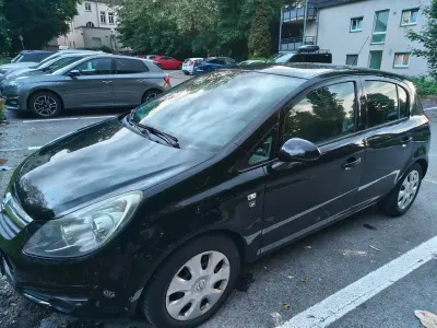 Używany Opel Corsa Selection 69 KM (50 kW) 2010 Czarny Hatchback