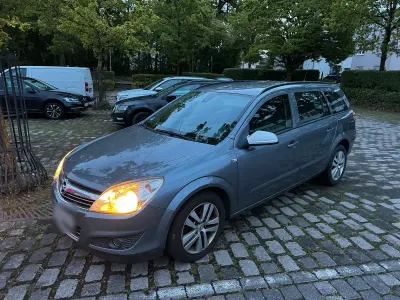 Używany Opel Astra 120 KM (88 kW) 2007 Szary Kombi