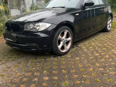 Usado BMW 116 122 CV (89 kW) 2009 Negro Utilitario