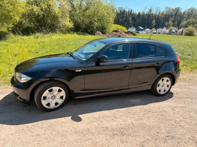 Gebraucht BMW 116 122 PS (89 kW) 2011 Schwarz Kleinwagen