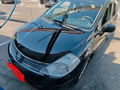Gebraucht Nissan Tiida 110 PS (80 kW) 2009 Schwarz Kleinwagen