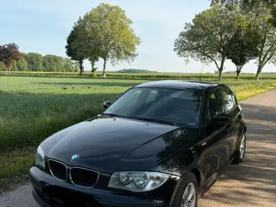 Gebraucht BMW 116 116 PS (85 kW) 2006 Schwarz Kleinwagen