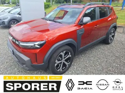 Gebraucht Dacia Duster Journey 141 PS (103 kW) 2025 Terracottabraun SUV