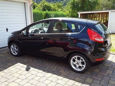 Second-hand Ford Fiesta Titanium 82 CP (60 kW) 2011 Negru Hatchback