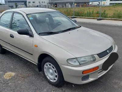 Gebraucht Mazda 323 88 PS (64 kW) 1996 Beige Limousine