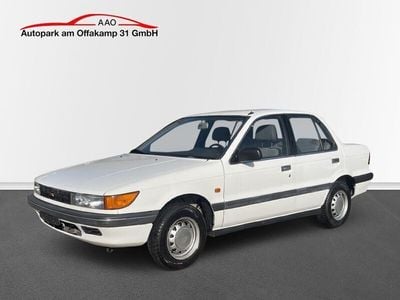 Second-hand Mitsubishi Lancer 90 CP (66 kW) 1992 Alb Berlinǎ
