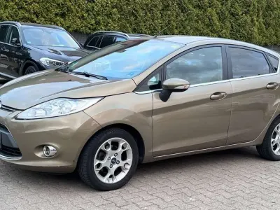 Gebraucht Ford Fiesta Cool & Sound Edition 95 PS (69 kW) 2011 Castanobraun metallic Kleinwagen