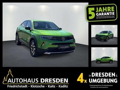 Second-hand Opel Mokka-e Elegance 100 kW (136 CP) 2022 Verde SUV