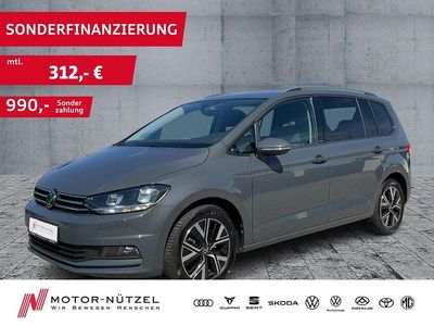 Delfingrau metallic Gebraucht 2024 VW Touran Move Van / Kleinbus | 31.940 € (Guter Preis)