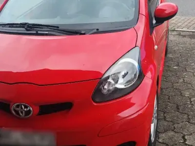 Gebraucht Toyota Aygo 68 PS (50 kW) 2009 Rot Kleinwagen