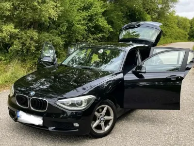 Używany BMW 116 Urban Line 136 KM (100 kW) 2014 Czarny Hatchback