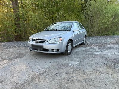 Second-hand Kia Cerato 113 CP (83 kW) 2006 Argintiu Berlinǎ