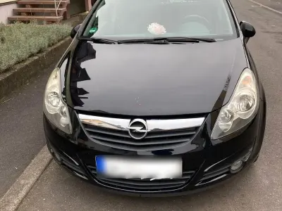 Używany Opel Corsa Color Edition 69 KM (50 kW) 2011 Czarny Hatchback