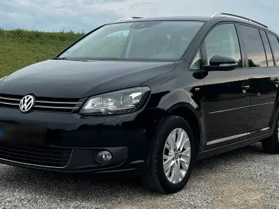 Gebraucht VW Touran Life 140 PS (102 kW) 2014 Schwarz Van / Kleinbus