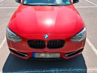 Używany BMW 116 Sport Line 136 KM (100 kW) 2011 Czerwony Hatchback