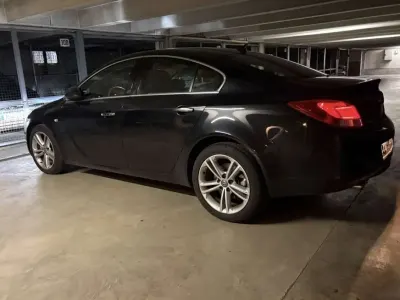 Używany Opel Insignia Active 220 KM (161 kW) 2012 Czarny Sedan/Limuzyna