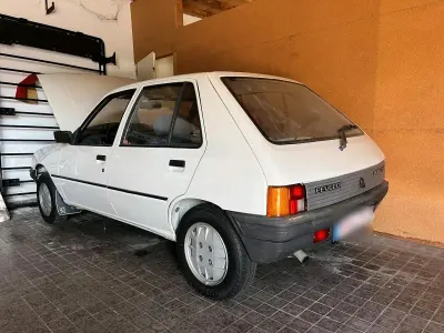 Gebraucht Peugeot 205 60 PS (44 kW) 1987 Weiß Kleinwagen