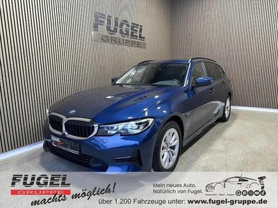 Gebraucht BMW 330e Advantage 252 PS (185 kW) 2022 Phytonicblau metallic Kombi