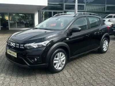 Gebraucht Dacia Sandero Expression 101 PS (74 kW) 2024 Perlmuttschwarz Limousine