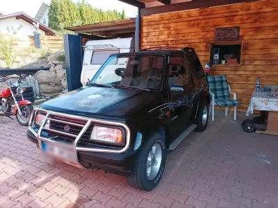 Gebraucht Suzuki Vitara 80 PS (58 kW) 1995 Schwarz Cabrio