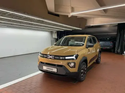 Gebraucht Dacia Spring Expression 19 kW (26 PS) 2025 Safaribeige Kleinwagen