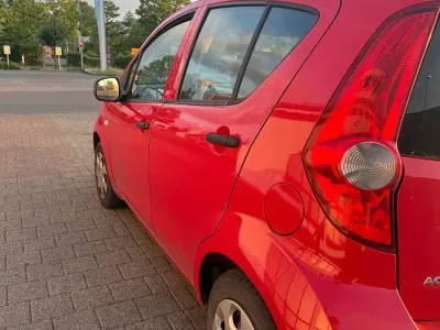 Gebraucht Opel Agila 68 PS (50 kW) 2010 Rot Kleinwagen