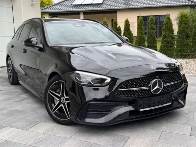 Gebraucht Mercedes C200 AMG 163 PS (119 kW) 2023 Schwarz/baltic black Kombi