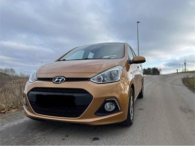 Gebraucht Hyundai i10 87 PS (63 kW) 2014 Orange Kleinwagen