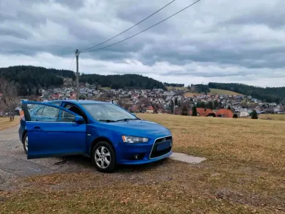 Gebraucht Mitsubishi Lancer 140 PS (102 kW) 2009 Blau Limousine