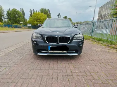 Gebraucht BMW X1 163 PS (119 kW) 2011 Schwarz SUV