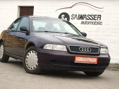 Używany Audi A4 101 KM (74 kW) 1995 Purpurowy Sedan/Limuzyna