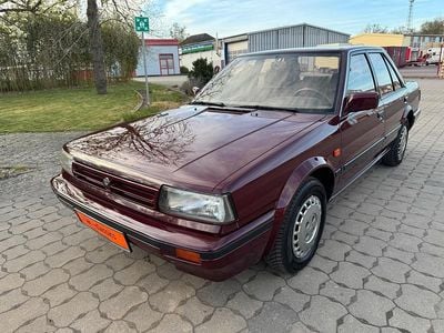 Begagnad Nissan Bluebird 105 HK (77 kW) 1990 Röd Sedan
