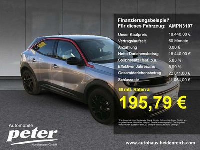 Gebraucht Opel Mokka-e GS Line 100 kW (136 PS) 2023 Kontrast grau/quarz silber SUV