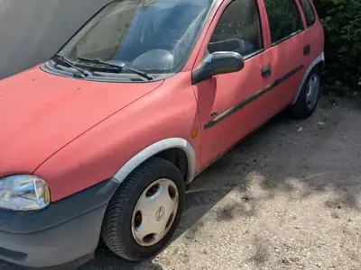 Second-hand Opel Corsa 54 CP (39 kW) 1999 Roșu Berlinǎ