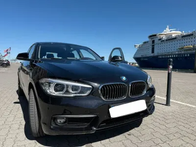 Używany BMW 116 Advantage 109 KM (80 kW) 2018 Czarny Hatchback
