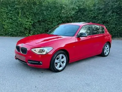 Gebraucht BMW 118 Sport Line 143 PS (105 kW) 2011 Rot Kleinwagen