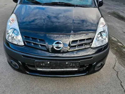 Gebraucht Nissan Pixo 68 PS (50 kW) 2009 Schwarz Kleinwagen