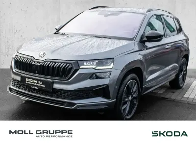 Gebraucht Skoda Karoq SportLine 190 PS (139 kW) 2023 Graphitegrau (metallic) SUV