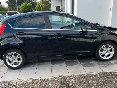 Gebraucht Ford Fiesta Titanium 95 PS (69 kW) 2012 Schwarz Limousine