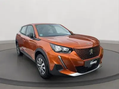 Gebraucht Peugeot e-2008 Active 100 kW (136 PS) 2023 Orange SUV