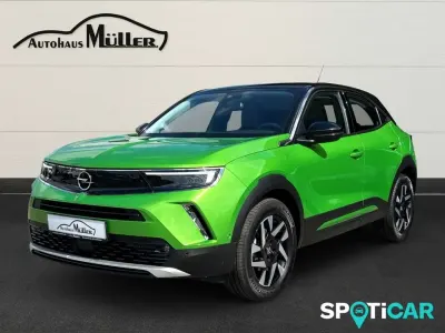 Gebraucht Opel Mokka Elegance 131 PS (96 kW) 2021 Matcha green/ikone gruen SUV