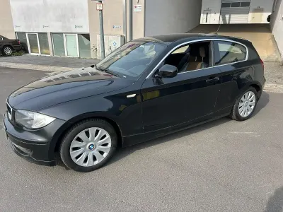 Gebraucht BMW 116 Sport Line 122 PS (89 kW) 2010 Schwarz Kleinwagen