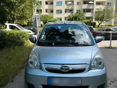 Gebraucht Daihatsu Cuore 70 PS (51 kW) 2009 Silber Kleinwagen