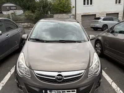 Gebraucht Opel Corsa Edition 87 PS (63 kW) 2012 Braun Kleinwagen