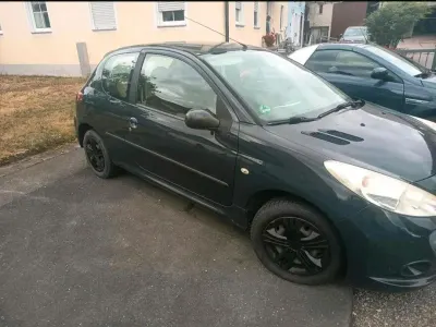 Gebraucht Peugeot 206+ 75 PS (55 kW) 2009 Grau Kleinwagen