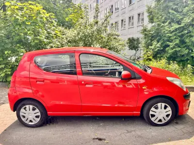 Gebraucht Nissan Pixo Visia 68 PS (50 kW) 2009 Rot Kleinwagen