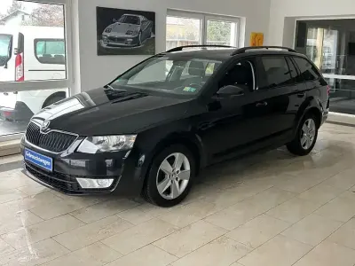 Second-hand Skoda Octavia Ambition 150 CP (110 kW) 2014 Negru Break